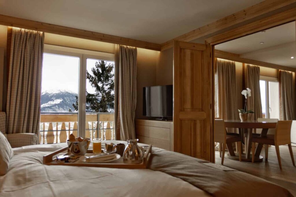 Bedroom of deluxe room in Hotel Royal Crans Montana